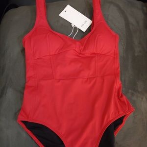 Her line one piece swiming suit
